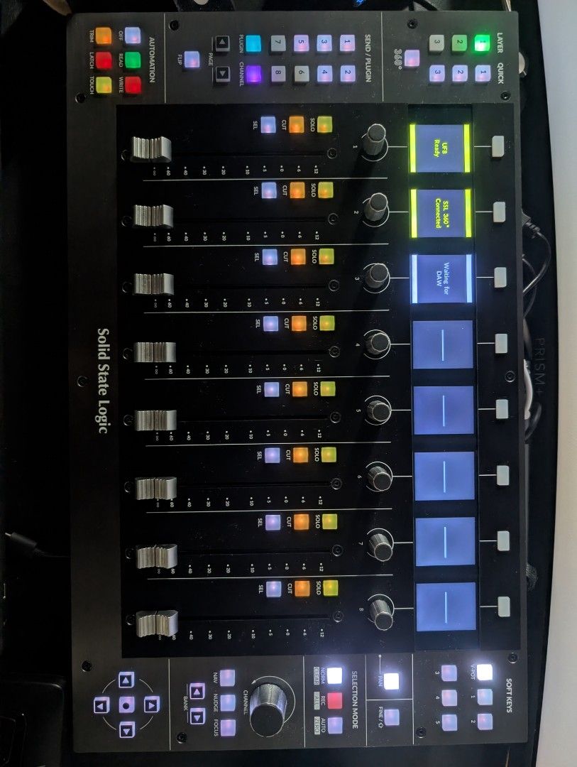Solid State Logic SSL UF8 Studio Controller (Category: Musical Instruments) located in Singapore. Submitted by dustoutmud (Listing ID 1467688715, Image 5). Description: Solid State Logic UF8 advanced DAW controller. Eight touch-sensitive motorized faders, multi-purpose encoder knobs, color TFT displays for track feedback. Automation controls including read, write, touch, and latch modes. Soft keys section and bank navigation buttons. Built-in SSL