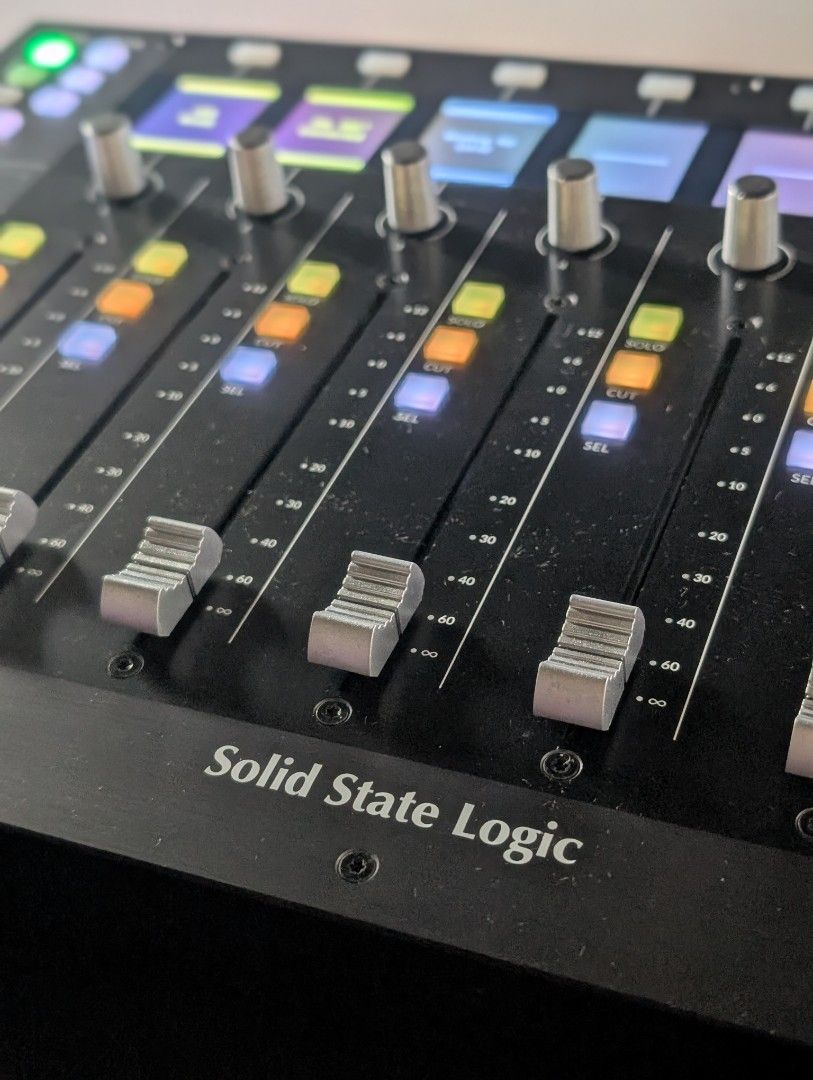 Solid State Logic SSL UF8 Studio Controller (Category: Musical Instruments) located in Singapore. Submitted by dustoutmud (Listing ID 1467688715, Image 1). Description: Solid State Logic UF8 advanced DAW controller. Eight touch-sensitive motorized faders, multi-purpose encoder knobs, color TFT displays for track feedback. Automation controls including read, write, touch, and latch modes. Soft keys section and bank navigation buttons. Built-in SSL