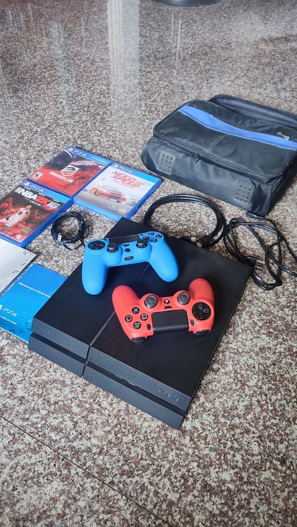 PlayStation 4 PS4 500GB (Category: PlayStation) located in Quezon City. Submitted by rapstoreph (Listing ID 1467627683, Image 1). Description: - Unit: Sony PlayStation 4 CUH-1215A 500GB (Black, fully tested and working) - Controllers: 2 DualShock 4 wireless controllers (Red and Blue, Bluetooth working perfectly) (1 cable charger only) - Cables: Power cable and HDMI cable included - Extras: Black and blue carrying case and original manuals - Condi