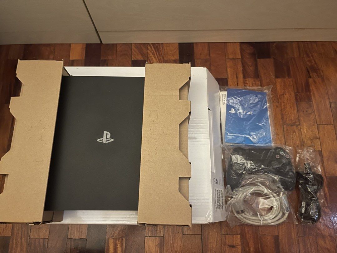 Sony PlayStation 4 PS4 Console Box Set Controller Cables (Category: PlayStation) located in Pasig City. Submitted by athriftrack (Listing ID 1467746416, Image 1). Description: - Authentic Sony PlayStation 4 console system - Complete with original box and cardboard inserts - Includes 1 x DualShock controller - Comes with power cable and HDMI/AV cable - Includes quick start guide manual - 100% ready for setup and gaming - Meetup or shipping options