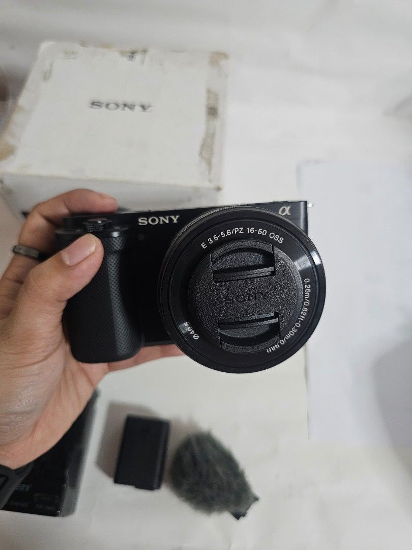 Sony ZV-E10 4K Mirrorless Camera with 16-50mm Lens (Category: Cameras) located in Marikina City. Submitted by aitaaaag (Listing ID 1467622477, Image 3). Description: - Sony ZV-E10 mirrorless camera body with white protective silicone case - E PZ 16-50mm f/3.5-5.6 OSS power zoom lens - Original box included - 1 Original battery - Pisen battery charger rfs: seldom used, additional funds for bills meetup and pickup only.