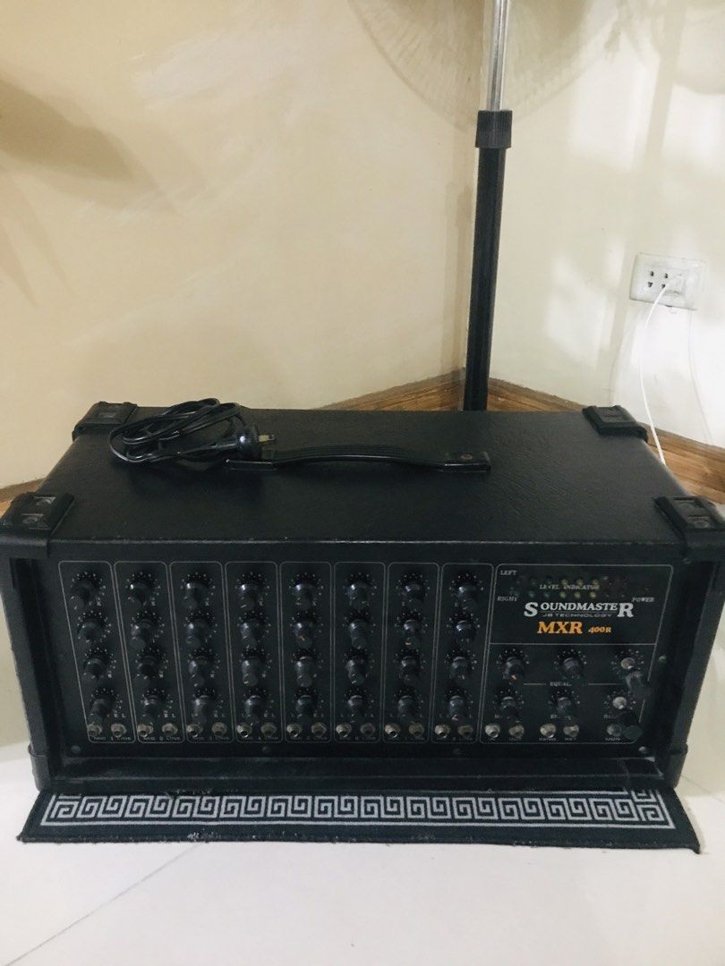 Soundmaster MXR 400R Audio Mixer Amplifier (Category: Soundbars, Speakers & Amplifiers) located in Manila. Submitted by cgrufino4850725 (Listing ID 1467759391, Image 1). Description: - Model: Soundmaster MXR 400R power mixer - Color: Sleek black finish with heavy-duty build and protective corner guards - Controls: Multiple channel inputs with individual rotary controls and front-panel graphic equalizer - Rear Panel: Power switch, fuse holder, and