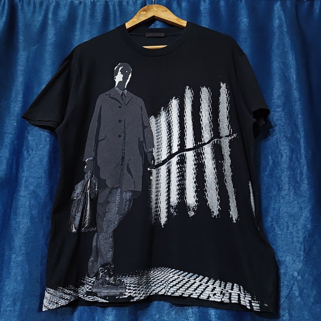 SS15 PRADA MILANO RUN AWAY TEE (Category: Tshirts & Polo Shirts ) located in Makati City. Submitted by upcycled.closeth (Listing ID 1467615020, Image 2). Description: - Authentic Prada milano product - Black / short sleeve tee - Size: Large (men's) - Like new - Authentic - flaws: no flaws - Excellent condition - Need wash, fresh from bale - Features design of Prada milano ss15 runaway tee - Material: 100% cotton !!STILL NEGOTIABLE!!.