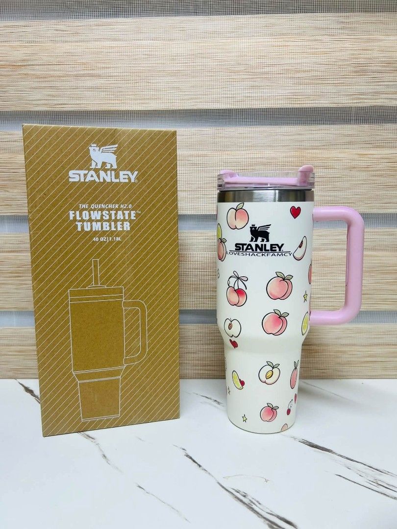 Stanley x LoveShackFancy 40oz Flowstate Tumbler (Category: Water Bottles & Tumblers) located in Manila. Submitted by onlineshopmate (Listing ID 1467789892, Image 2). Description: - Authentic Stanley x LoveShackFancy Quencher H2.0 Tumbler - Generous 40oz (1.18L) capacity for all-day hydration - Available cute designs: pink check, strawberries, peaches, pink stripes, and yellow lemons - Comes complete with original branded box - Features a secure t