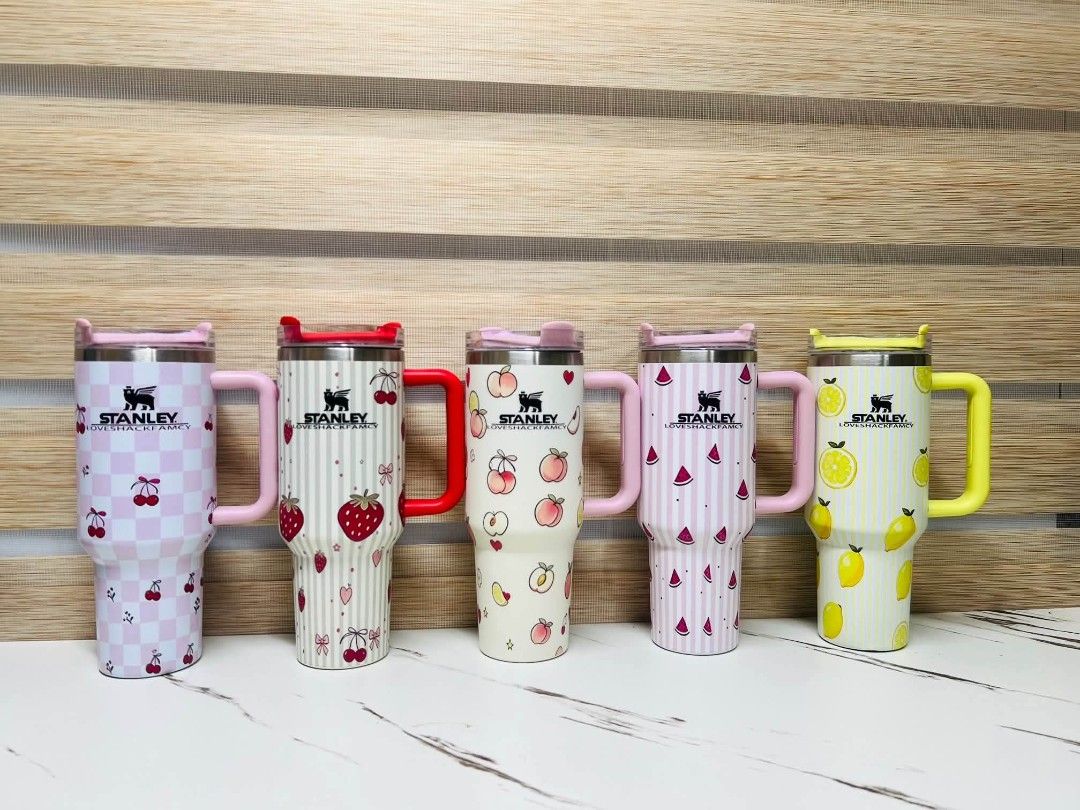 Stanley x LoveShackFancy 40oz Flowstate Tumbler (Category: Water Bottles & Tumblers) located in Manila. Submitted by onlineshopmate (Listing ID 1467789892, Image 1). Description: - Authentic Stanley x LoveShackFancy Quencher H2.0 Tumbler - Generous 40oz (1.18L) capacity for all-day hydration - Available cute designs: pink check, strawberries, peaches, pink stripes, and yellow lemons - Comes complete with original branded box - Features a secure t
