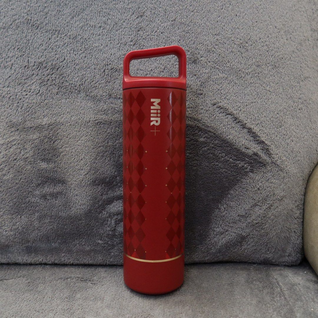 Starbucks MiiR Red Argyle Pattern Insulated Water Bottle (Category: Water Bottles & Tumblers) located in Manila. Submitted by gentlewind_62f064 (Listing ID 1467617083, Image 2). Description: - Authentic Starbucks x MiiR collaboration water bottle - Striking red body with a chic darker red geometric argyle pattern - Elegant gold accents near the base - Suitable for both hot and cold beverages - Convenient built-in handle on the cap for easy carryi