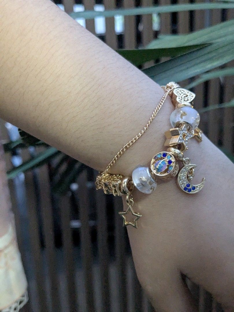 Starry Night Charm Bracelet (Category: Bracelets) located in Quezon City. Submitted by nnncorner (Listing ID 1467718231, Image 2). Description: Starry Night Charm Bracelet New and velvet box included Fits 11-19 cm wrist Perfect for gifting Hypoallergenic Not for acidic Made in Korea Not lightweight 780.