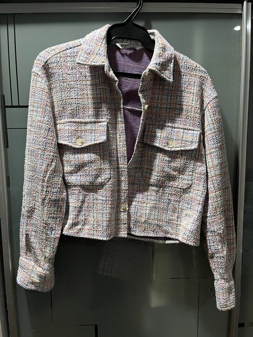 Stradivarius Tweed Crop Jacket Multicolour Size S (Category: Coats, Jackets and Outerwear) located in Makati City. Submitted by grizzlybear95 (Listing ID 1467734350, Image 1). Description: - Brand: Stradivarius - Style: Multicolour plaid tweed jacket with cropped fit - Color: White base woven with pink, orange, blue, and black threads - Details: Button-up front, classic collar, and two chest pockets with button flaps - Interior: Contrasting purpl