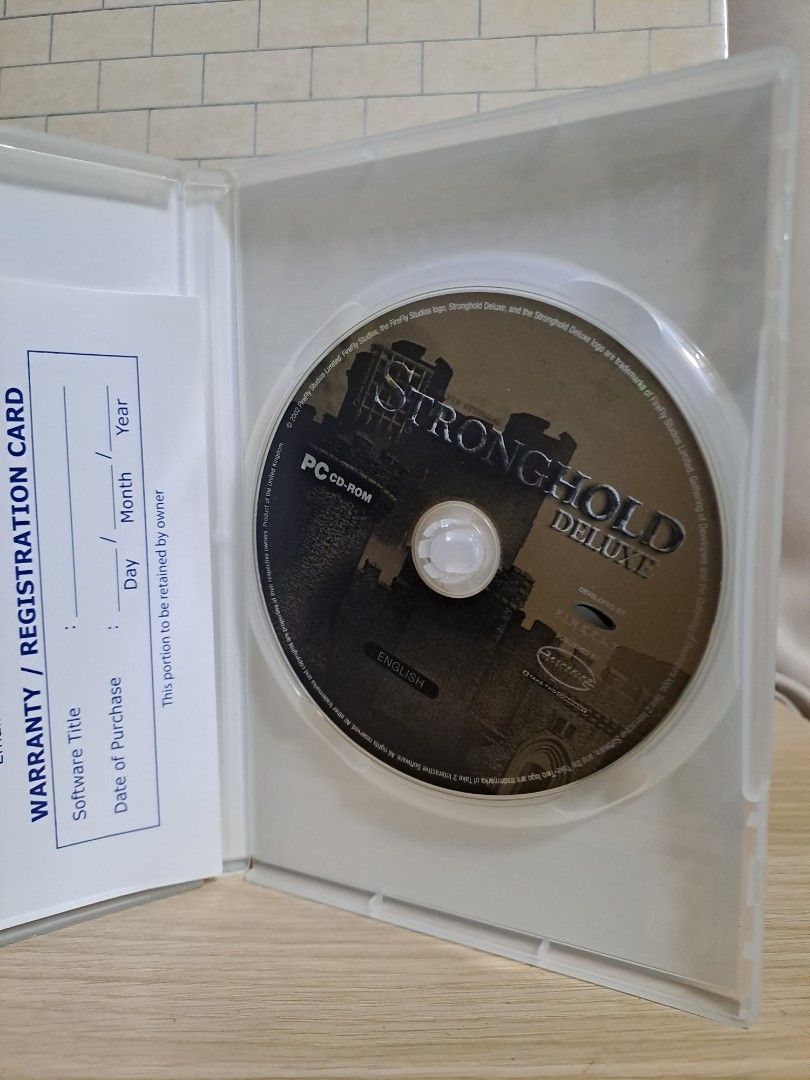 Stronghold Deluxe PC CD-ROM Game (Category: CDs & DVDs) located in Las Pinas. Submitted by cobieshop (Listing ID 1467772793, Image 1). Description: 🎮 PC GAME FOR SALE | ORIGINAL & COLLECTIBLE GAMES 🕹️ Title: [Stronghold Deluxe PC CD-ROM] 💿 Platform: PC / Windows 📌 Condition: [VG] 📦 Inclusions: [Game Disc, Case, Manual, Inserts, etc.] ✅ Actual item shown in photos ✅ Please check the item's condition and inclusions before purchasing ✅ Compatib