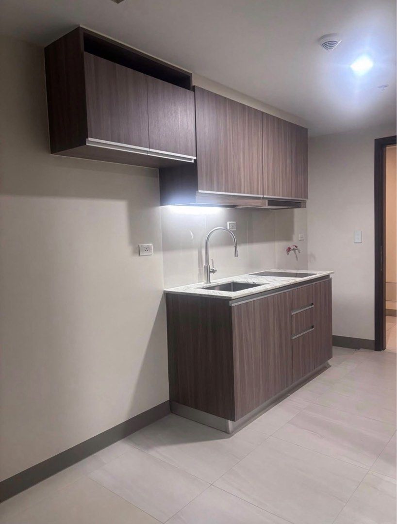 Studio Unit with Built-in Kitchen Cabinets and Wardrobe (Category: Shelves, Cabinets & Racks) located in Manila. Submitted by 1111anze (Listing ID 1467621536, Image 1). Description: ✨ PARK McKINLEY WEST ✨ 🏙️ Own a Brand-New 1BR Unit in McKinley 💰 Selling Price: ₱11M- net 🏡 Unit Features: ✅ 38 sqm 🛏️ 1 Bedroom 🏢 2nd Floor 🌿 Near/Access to Amenities 🆕 Brand-New Unit 🏠 Bare Unit (AC INCLUDED) – Design it your way 🚫 No Parking 📩 Send me a m