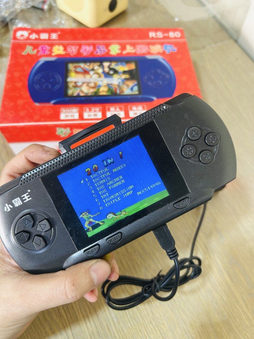 Subor RS-80 Handheld Game Console (Category: Nintendo) located in Manila. Submitted by starbalesukandjapansurplus (Listing ID 1467625709, Image 2). Description: - Model: Subor RS-80 Handheld Console (Black) - Condition: Tested and 100% working, charges properly with green indicator light - Display & Audio: 3.2-inch color screen and built-in speaker - Controls: D-pad, action buttons, select, start, and power switch - Extras: Preloaded with classic