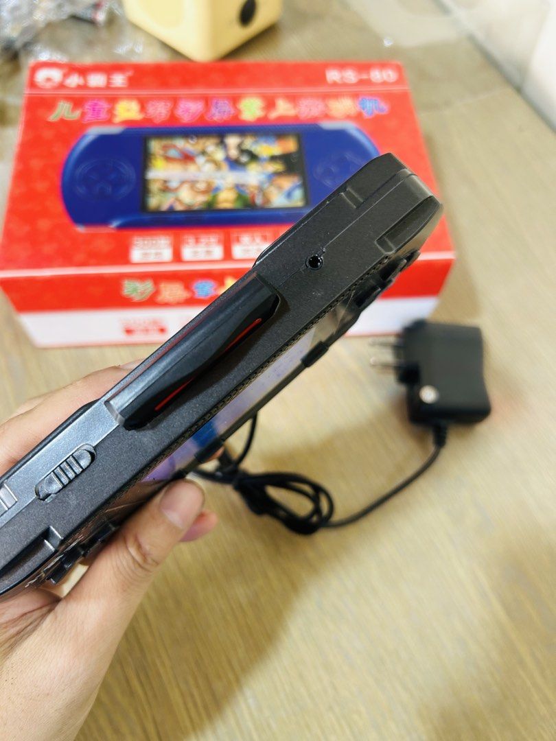 Subor RS-80 Handheld Game Console (Category: Nintendo) located in Manila. Submitted by starbalesukandjapansurplus (Listing ID 1467625709, Image 3). Description: - Model: Subor RS-80 Handheld Console (Black) - Condition: Tested and 100% working, charges properly with green indicator light - Display & Audio: 3.2-inch color screen and built-in speaker - Controls: D-pad, action buttons, select, start, and power switch - Extras: Preloaded with classic