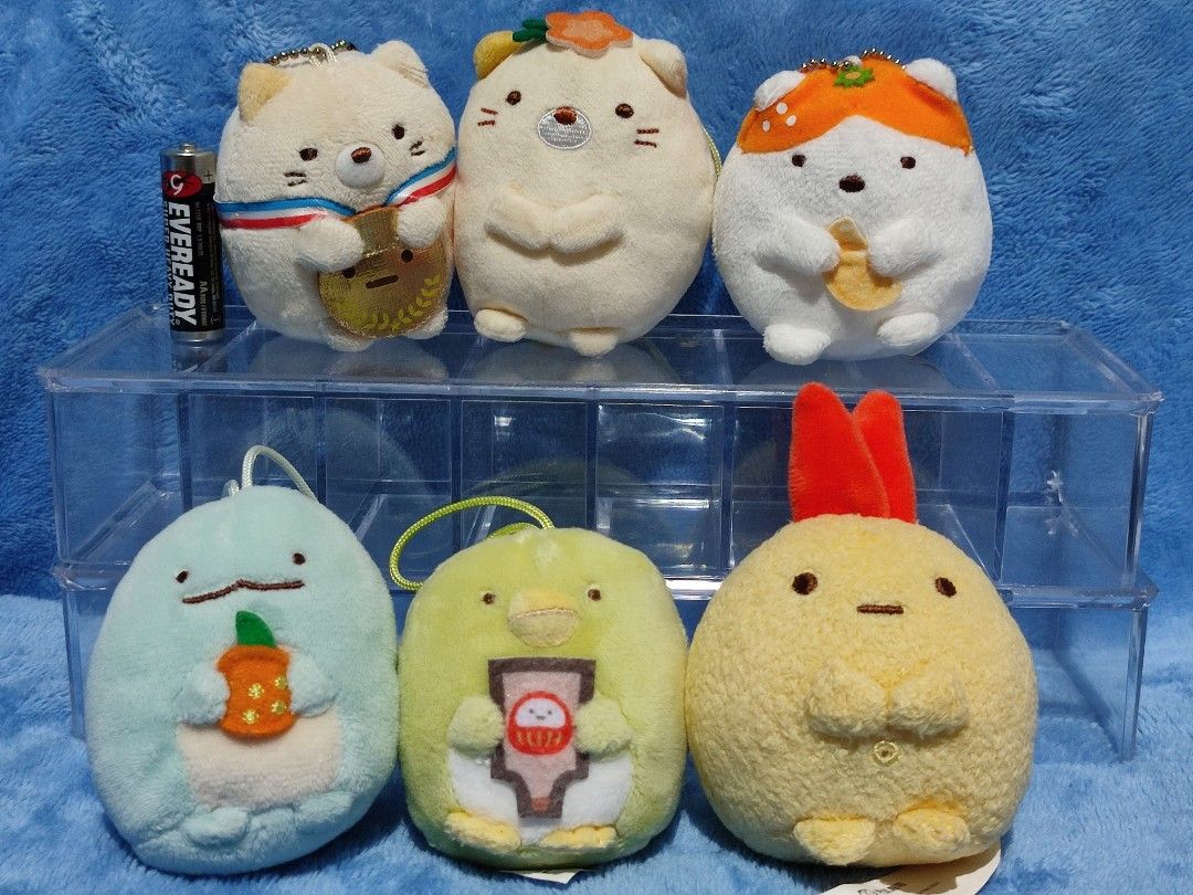 Sumikko Gurashi Plush Toy/Charm Collection (Category: Plushies & Soft Toys) located in Baguio. Submitted by abigailmyra (Listing ID 1467610411, Image 2). Description: - Genuine San-X Sumikko Gurashi plush toys - Various adorable characters with items like medals, oranges, and snacks - Equipped with loops for hanging or keychains -P35-P85 each, details in the photos loc:Baguio-CAR.