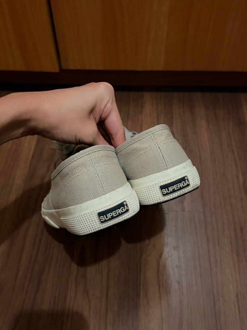 Superga Classic Canvas Sneakers Beige (Category: Sneakers) located in Quezon City. Submitted by hellopucca (Listing ID 1467707097, Image 3). Description: - Brand: Superga - Style: Low-top canvas sneakers with lace-up closure - Color: Neutral beige (easy to match with any outfit) - Features: Signature side tab and durable rubber soles - Condition: Great everyday casual shoes with minor wear visible on the toe bumpers.