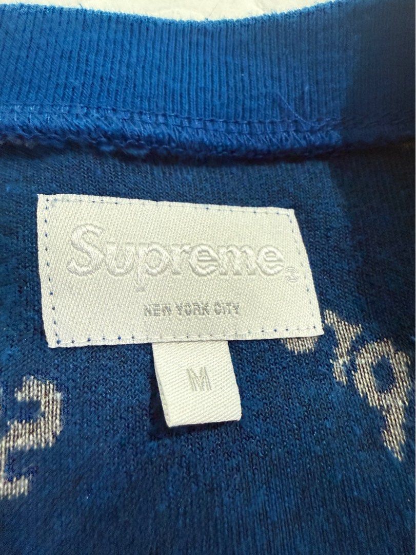 Supreme All-Over Print Blue Sweater Size M (Category: Coats, Jackets and Outerwear) located in Angono. Submitted by marketplacesellerph610 (Listing ID 1467719669, Image 3). Description: Authentic - Brand: Supreme - Color: Royal Blue with all-over white logo print - Size: Medium (tag on collar and wash label intact) - Material: Soft terry fleece - Design: Long sleeves, crew neck 1500.