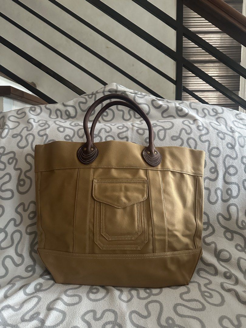 Tan canvas tote bag (Category: Tote Bags) located in Quezon City. Submitted by prelovedbagsbygiv (Listing ID 1467647617, Image 1). Description: .