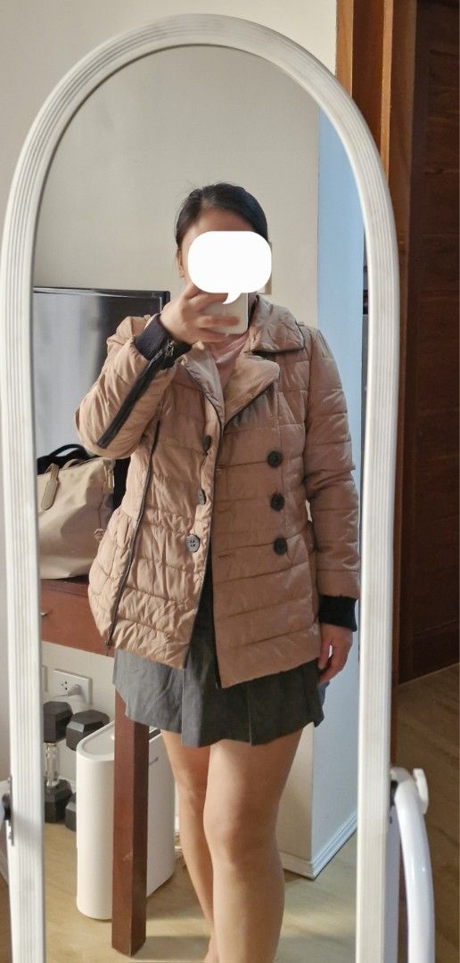 Tan Puffer Jacket Winter Coat (Category: Coats, Jackets and Outerwear) located in Muntinlupa City. Submitted by prelovedbysandy (Listing ID 1467631303, Image 2). Description: - Brand/Model: BHZX Tan Quilted Puffer Jacket - Color: Versatile neutral khaki brown - Closure: Asymmetrical zipper with large black front buttons - Features: Collared neckline, ribbed black cuffs to block the cold, and front pockets - Fit: Pit-to-pit is approximately 18.5 i