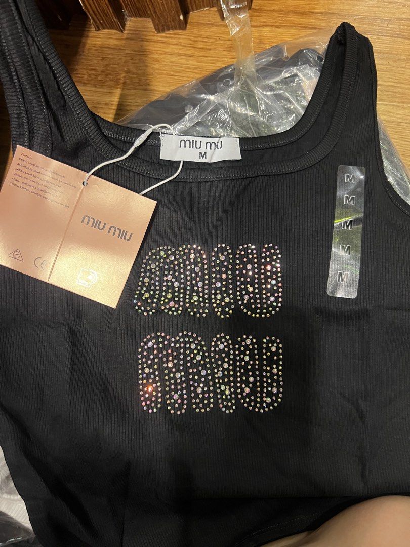 Tank Top (Category: Sleeveless) located in Manila. Submitted by chellerocker05 (Listing ID 1467605846, Image 3). Description: White & Black Color With Sizes S/M/L/XL.