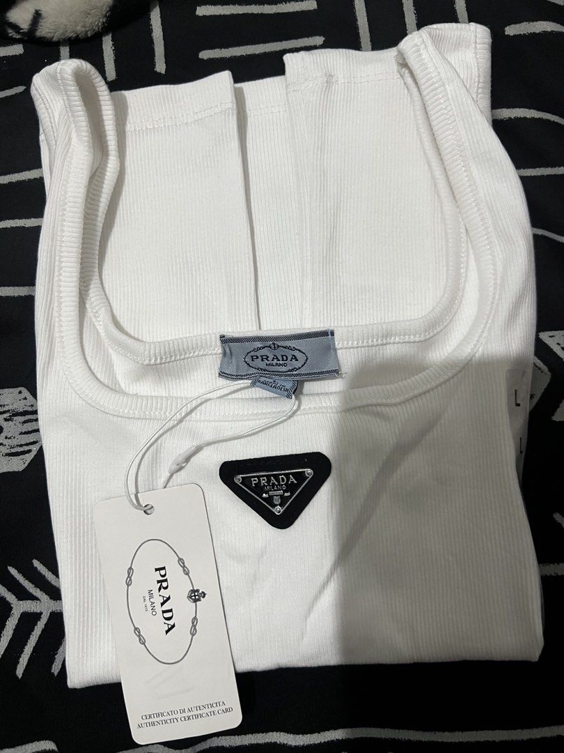 Tank Top (Category: Sleeveless) located in Manila. Submitted by chellerocker05 (Listing ID 1467605846, Image 1). Description: White & Black Color With Sizes S/M/L/XL.