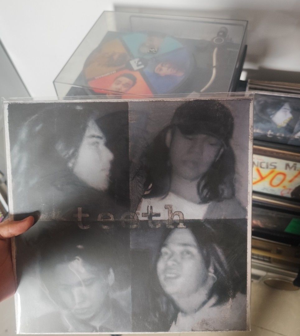 Teeth Self-Titled Vinyl Record Album (Category: Vinyls) located in Valenzuela. Submitted by xjepsx (Listing ID 1467661918, Image 1). Description: - Artist/Album: Teeth (Self-Titled) - Genre: Classic OPM Alternative Rock - Format: Vinyl Record - Condition: Plays great, stored carefully, comes with clear plastic outer sleeve - Cover Art: Features iconic black and white band member portraits - Perfect for: Local rock music collectors and vinyl enthu