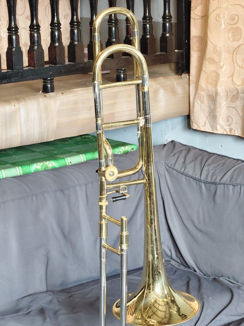 TENOR TROMBONE WITH F-ATTACHMENT (Category: Musical Instruments) located in Cavite. Submitted by flutist101 (Listing ID 1467630664, Image 2). Description: TENOR TROMBONE WITH F-ATTACHMENT LARGE BORE WITH 3PCS MPC: YAMAHA 51C4L THOMSON 5G DENIS WICK HERITAGE 6BL COPY NO CASE NO STAND BRAND (TENERO) MAGANDA MALUBAY SLIDE MAKAPAL ANG BARA DI BASTA MAYUYUPI NO PLAYING ISSUE SIGN OF USAGE INGAT NA INGAT DYAN RFS: NEED FUND SAKA BALIK SINGLE MUNA 22K I