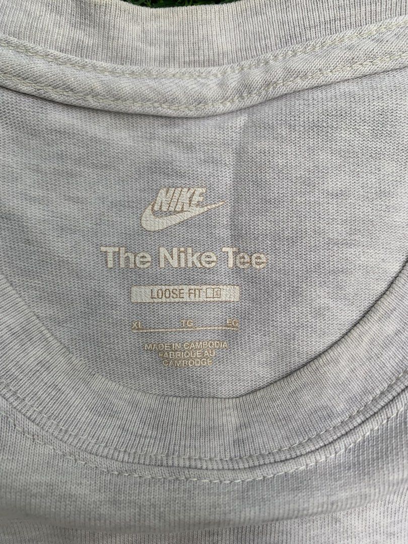 The Nike Tee (Nike Premium Essentials T-Shirt) (Category: Activewear) located in Dapitan. Submitted by _joemariesacal.23 (Listing ID 1467775546, Image 3). Description: -Light grey/marl colorway -Heavyweight organic cotton -Width 21 -Length 27 -XL on tag but can fit medium to large.