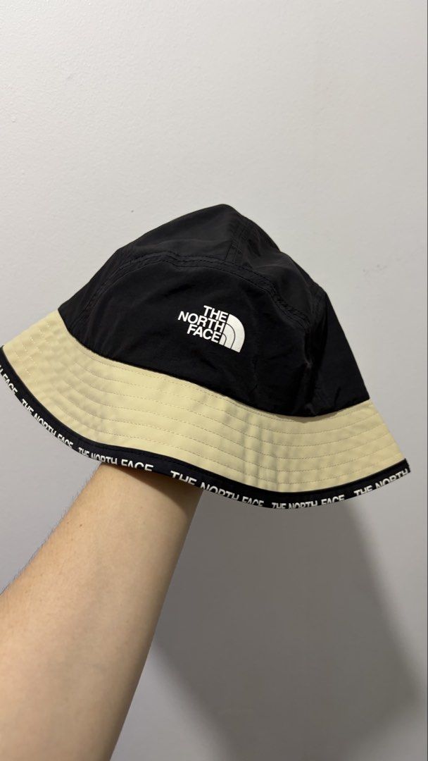 The North Face bucket hat (black/sand, Large) (Category: Hats & Beanies) located in Quezon City. Submitted by sefdeclutters (Listing ID 1467662214, Image 1). Description: FOR SALE: ITEM: The North Face Bucket Hat (black/sand) CONDITION: 10/10 PRICE: ^price (negotiable for buyers who can get this asap) RFS: gifted to me, but I am not a bucket hat guy :(.