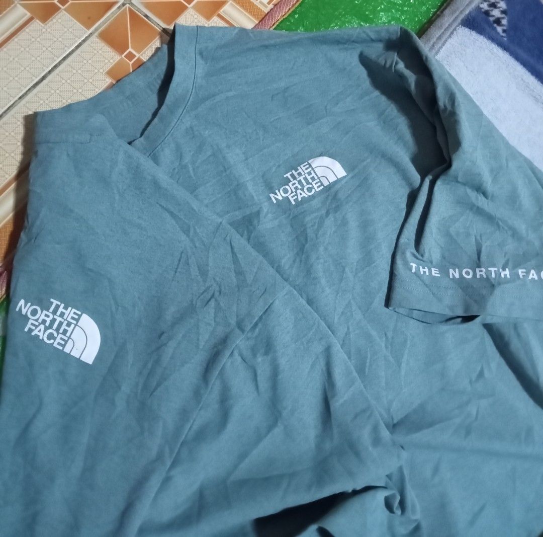The north face tee (Category: Tshirts & Polo Shirts ) located in Alburquerque. Submitted by ayrelieonlineshop (Listing ID 1467652398, Image 2). Description: TNF loose fit men's tee size 2XL Dimensions W-24 L-28.5 Very excellent condition No pinhole or punit 9.8/10 color rate Only 650 Location liloan Cebu Philippines.