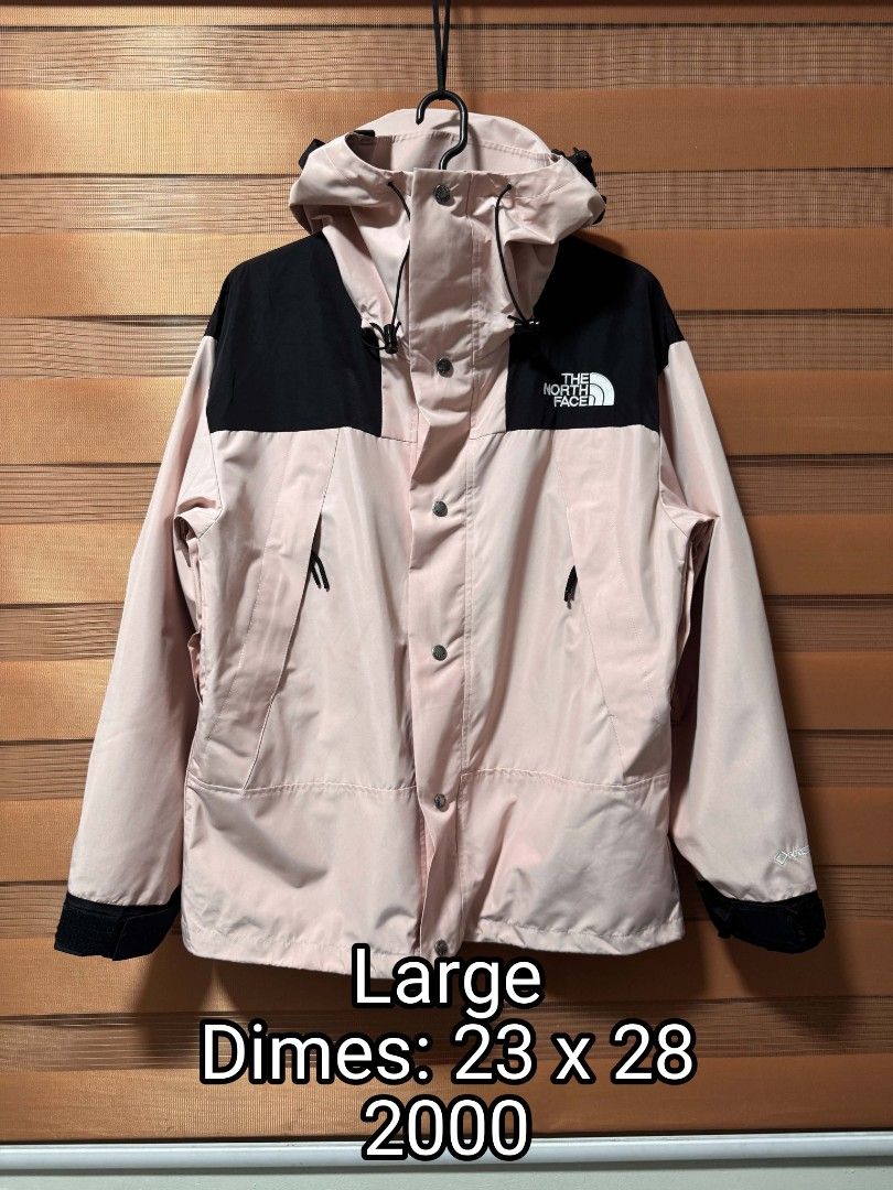The North Face Waterproof Windproof Jacket Pink Black Large (Category: Coats, Jackets and Outerwear) located in Makati City. Submitted by rexb1993 (Listing ID 1467671129, Image 2). Description: - Brand: The North Face - Style: Outdoor Jacket - Color: Pink and Black - Size: Large (Chest: 23", Length: 28") - Material: Genuine Gore-Tex - Weather Protection: Waterproof, windproof, and breathable for all weather conditions - Features: Adjustable draws