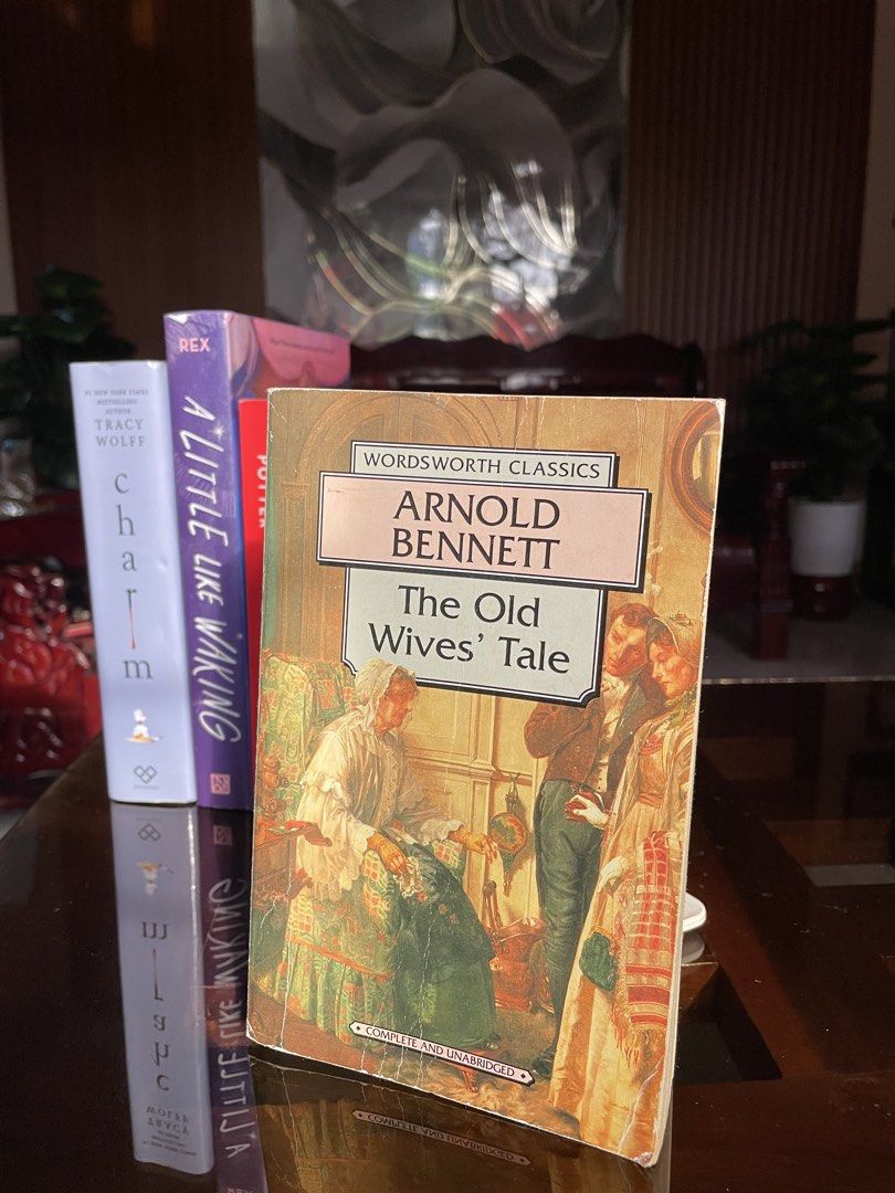 The Old Wives' Tale by Arnold Bennett Wordsworth Classics (Category: Storybooks) located in Muntinlupa City. Submitted by sabelle.ylc (Listing ID 1467729008, Image 1). Description: - Title: The Old Wives' Tale by Arnold Bennett - Edition: Wordsworth Classics Paperback - Cover: Vintage artwork featuring an older woman and a younger couple - Condition: Minor spine creasing and edge wear; pages are completely intact and legible .