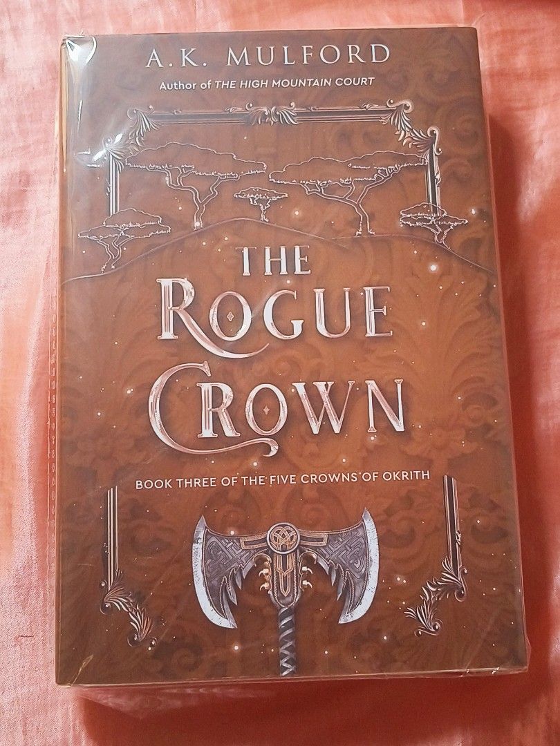 THE ROGUE CROWN by A.K. Mulford (Category: Storybooks) located in Manila. Submitted by chickizee (Listing ID 1467626106, Image 1). Description: 📚 THE ROGUE CROWN by A.K. Mulford 💸 Selling for: ₱500 ✨ Brand new and never read! 📖 Hardcover edition 🛍️ Book 3 of The Five Crowns of Okrith 🤎 Beautiful hardcover copy, perfect for fantasy and romantasy readers! 📍 Location: Malate, Manila 📦 Shipping c/o buyer 💌 PAYO ❌ No meet-ups Please check the 