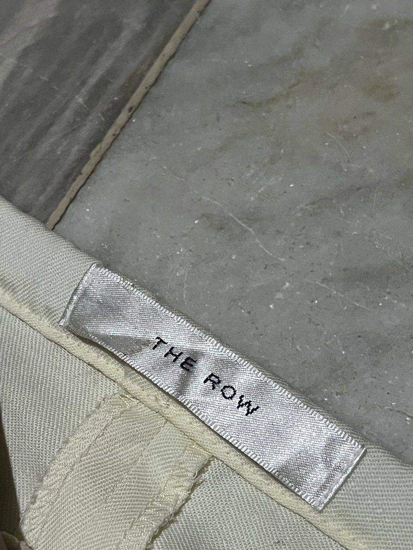 The Row Ivory Wool Pants (Category: Other Bottoms) located in Camaligan. Submitted by thriftcouturebyaybs (Listing ID 1467751076, Image 2). Description: - Like New Condition - No issue - Buyer Should Handle The Shipping Cost - W: 28-36 inch - L: 40 inch .