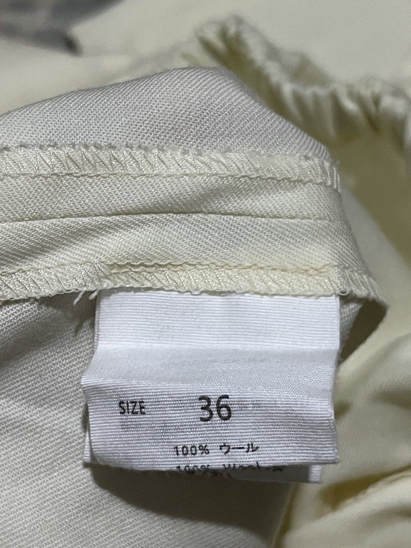 The Row Ivory Wool Pants (Category: Other Bottoms) located in Camaligan. Submitted by thriftcouturebyaybs (Listing ID 1467751076, Image 3). Description: - Like New Condition - No issue - Buyer Should Handle The Shipping Cost - W: 28-36 inch - L: 40 inch .