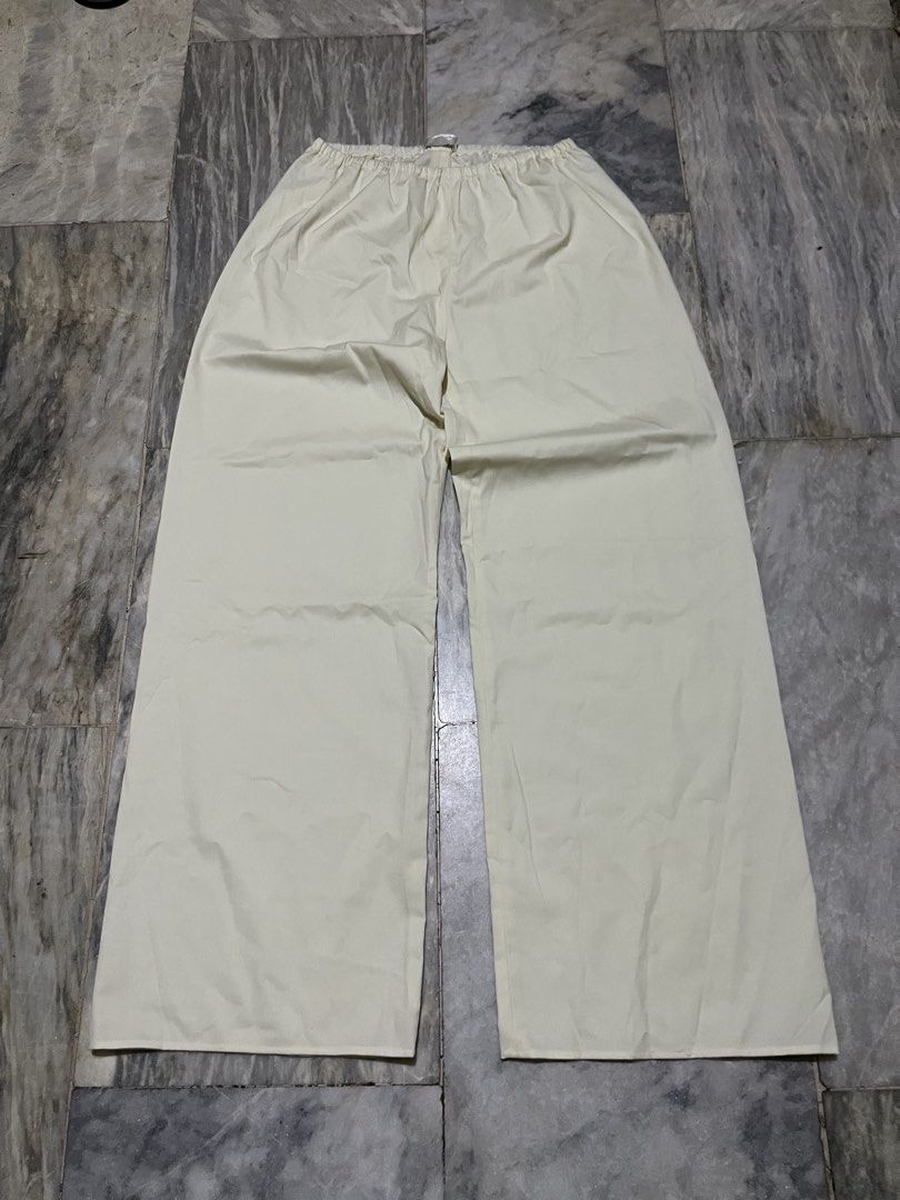 The Row Ivory Wool Pants (Category: Other Bottoms) located in Camaligan. Submitted by thriftcouturebyaybs (Listing ID 1467751076, Image 1). Description: - Like New Condition - No issue - Buyer Should Handle The Shipping Cost - W: 28-36 inch - L: 40 inch .