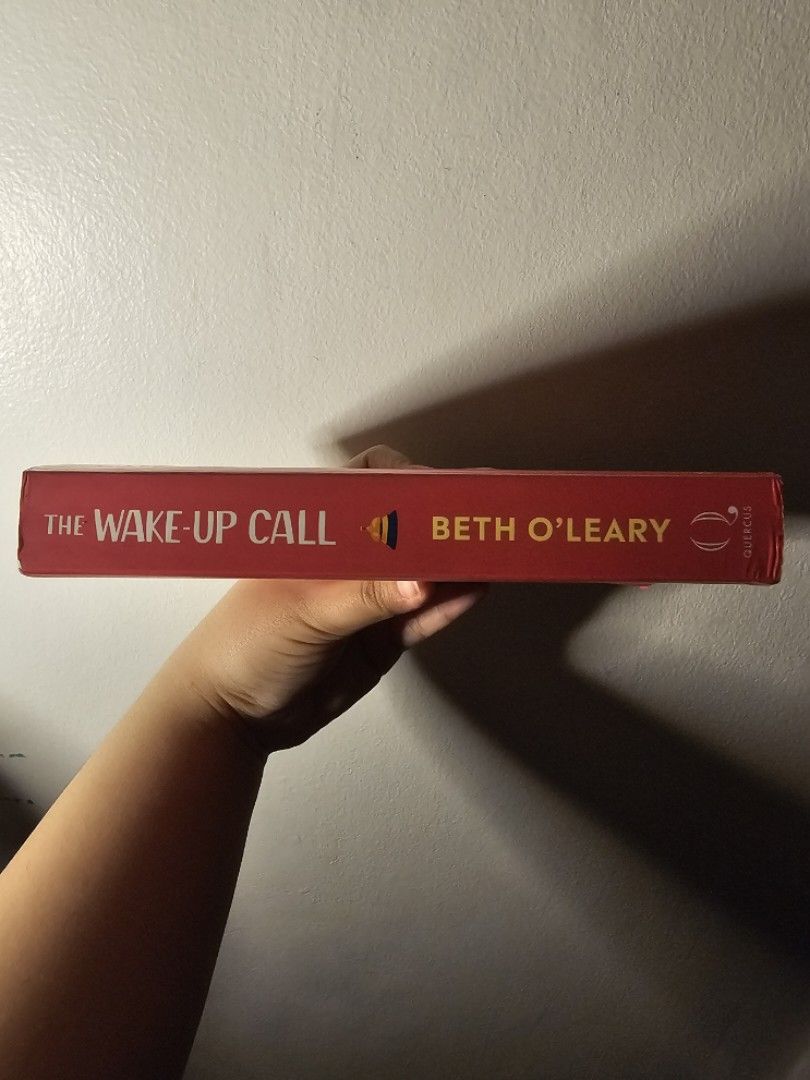 The Wake-Up Call by Beth O'Leary (Category: Storybooks) located in Marikina City. Submitted by rkjjj21 (Listing ID 1467615104, Image 3). Description: - Title: Romance novel by Beth O'Leary - Publisher: Quercus Fiction - ISBN: 978-1-52941-826-2 - Trope: Enemies-to-lovers story set in a hotel - Condition: Read once, pages and spine in great shape - Bonus: Includes exclusive extra content at the back - Format: Paperback - RFS: Decluttering due to mu