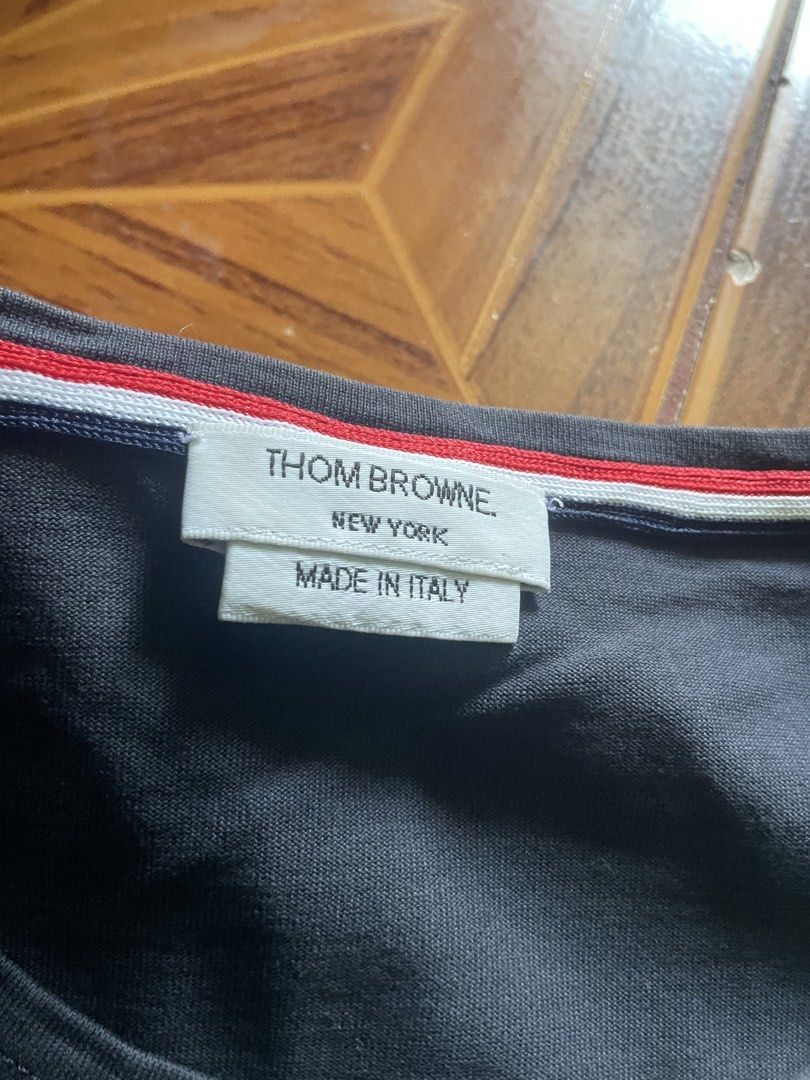 Thom browne shirt (Category: Luxury Apparel) located in Manila. Submitted by kerikeridulce (Listing ID 1467638742, Image 2). Description: Size 2 Authentic no flaws .