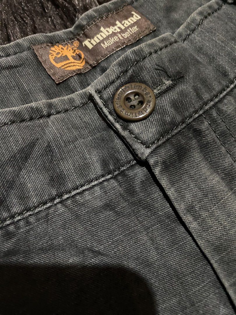 Timberland Dark Grey Casual Pants Size 30 (Category: Jeans) located in Manila. Submitted by coollion.19b40f (Listing ID 1467774588, Image 2). Description: - Brand: Timberland - Size: 30 - Color: Dark Grey - Material: 100% cotton canvas - Fit: Straight leg - Details: Classic button closure with branded button, waist tag, and subtle embroidered tree logo near the front pocket - Condition: Excellent - Perfect for casual, everyday wear.