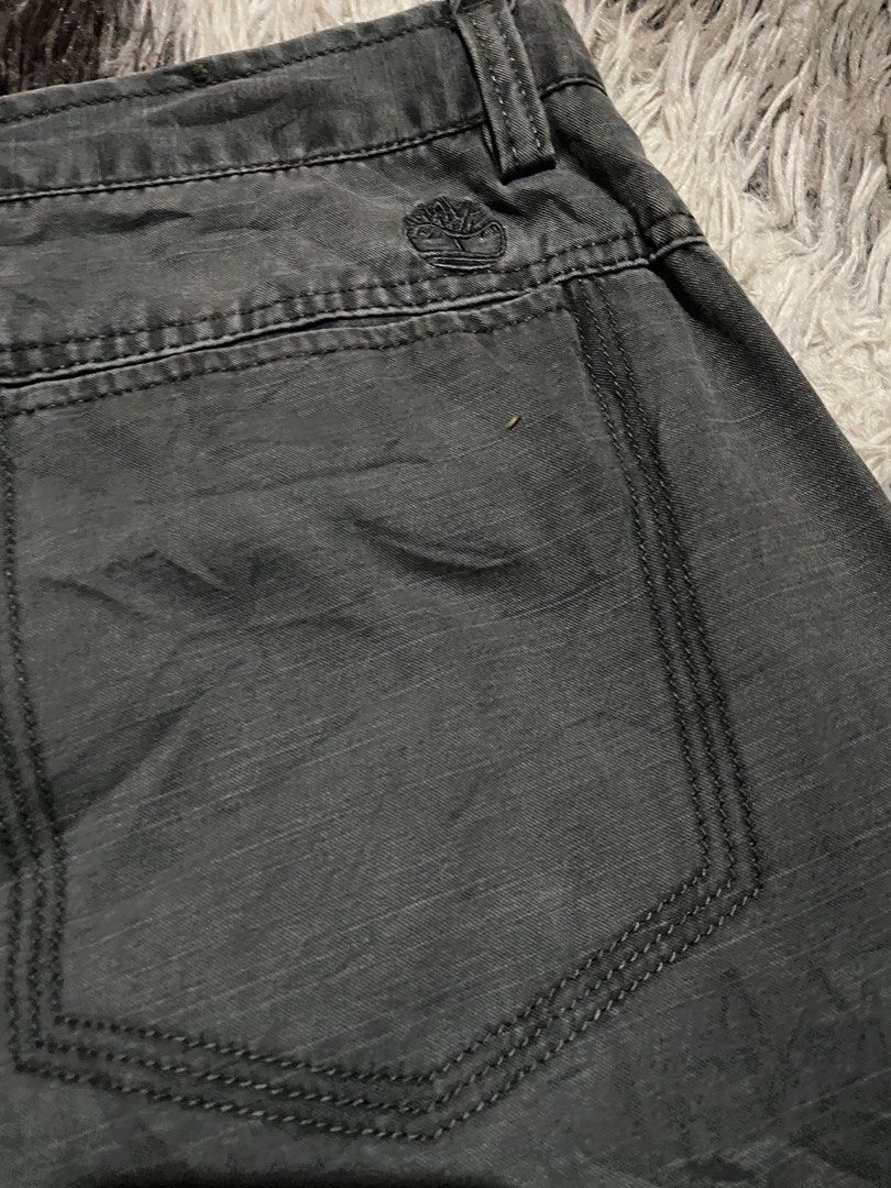 Timberland Dark Grey Casual Pants Size 30 (Category: Jeans) located in Caloocan City. Submitted by remythrift (Listing ID 1467785828, Image 2). Description: - Brand: Timberland - Color: Dark Grey - Size: 30 Waist - Fit: Straight leg - Closure: Button closure with branded hardware - Pockets: Standard front and back pockets - Material: 100% material details on inner tags - Condition/Style: Solid everyday wear, pairs easily with casual tees or hoodi