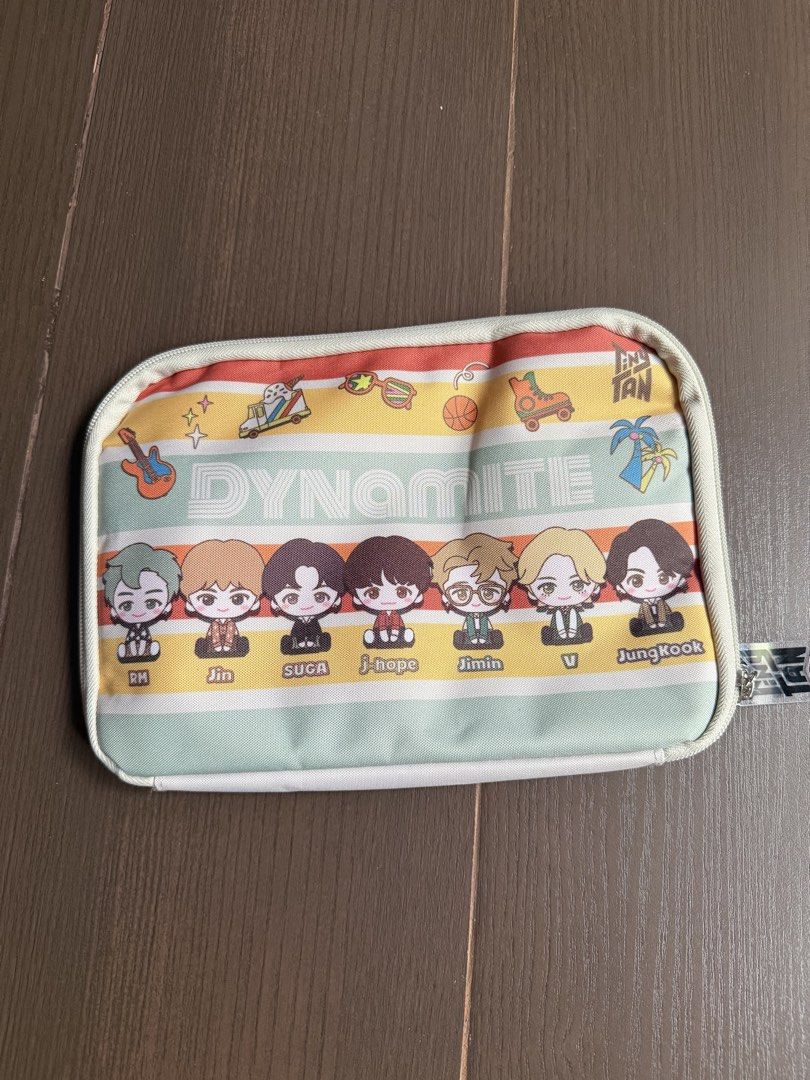 TinyTAN Dynamite Pouch (Category: K-Wave Merchandise) located in Marikina City. Submitted by culose (Listing ID 1467714951, Image 1). Description: - Authentic BTS TinyTAN Dynamite theme pouch - Features all 7 members (RM, Jin, Suga, j-hope, Jimin, V, Jungkook) in adorable chibi style - Vibrant pink interior lining with fun DISCO patterns - Convenient mesh divider pocket inside for better organization - Secure zip-top closure to keep your items sa