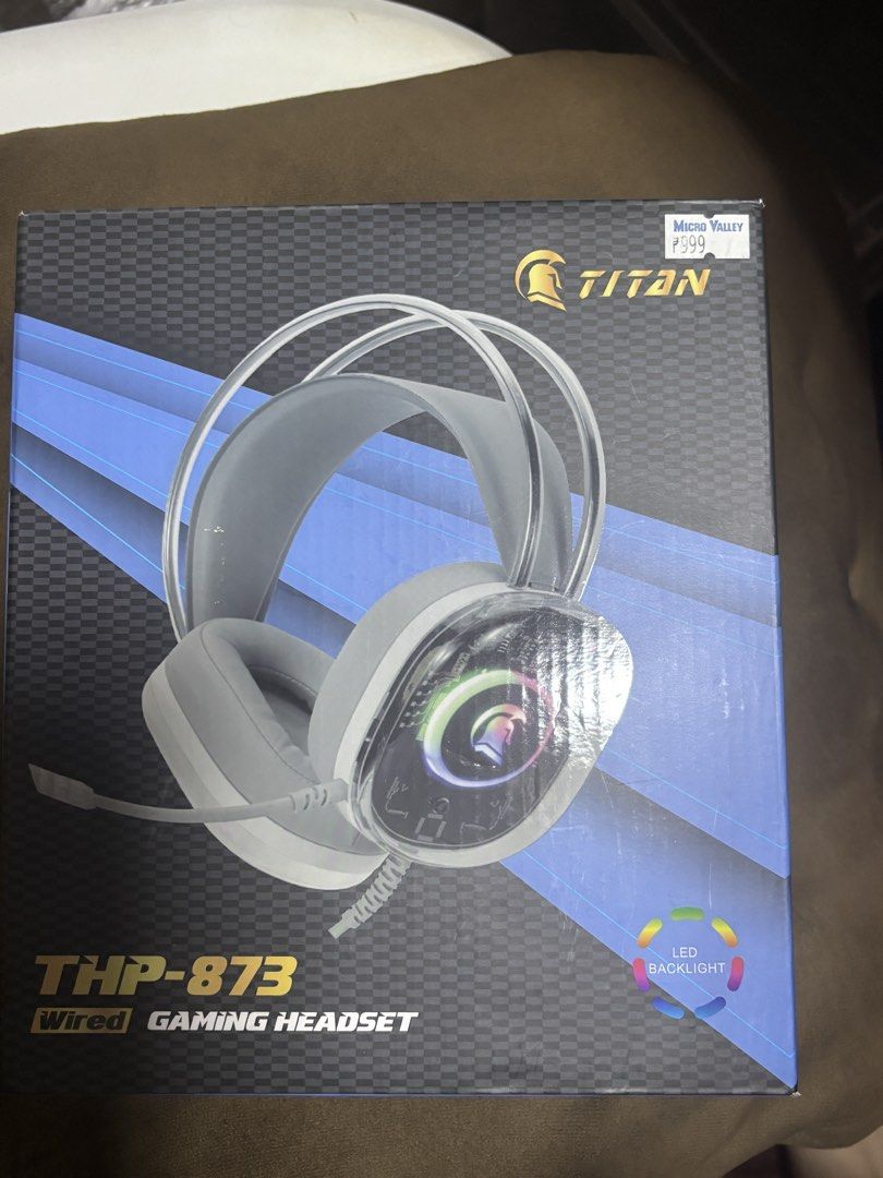 Titan THP-873 Wired Gaming Headset (Category: Headphones & Headsets) located in Quezon City. Submitted by qcdecluttering (Listing ID 1467625414, Image 1). Description: - Model: Titan THP-873 Wired Gaming Headset - Connectivity: USB 2.0 plug-and-play - Condition: Never used, only removed from the original box for photos - original price: 999, nakatambak lang - negotiable.