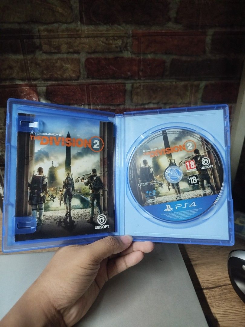 Tom Clancy's The Division 2 PS4 Game (Category: PlayStation) located in Binan City. Submitted by pumpkiiin02 (Listing ID 1467729565, Image 3). Description: - Game: Tom Clancy's The Division 2 for PlayStation 4 (PS4) - Condition: Complete with case, disc, and manual - Region: Region 2 PAL version - Gameplay: Action shooter set in Washington D.C. with solo and multiplayer modes - Shipping: Ships fast, or available for meetups.