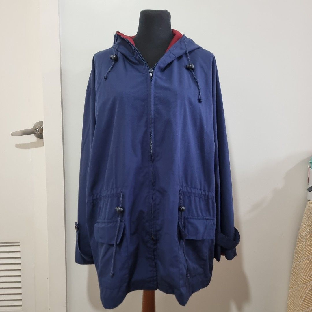 Tom Dick & Harry by Rustans Blue Hooded Jacket (Category: Coats, Jackets and Outerwear) located in Pasig City. Submitted by lesmitch (Listing ID 1467649195, Image 1). Description: - Brand: Tom Dick & Harry by Rustans - Color: Dark blue with contrasting red inner lining - Size: Medium (tag on collar) - Closure: Full front zip - Hood & Hem: Adjustable drawstrings for a customized fit - Pockets: Deep flap pockets on both sides - Cuffs: Secured with 