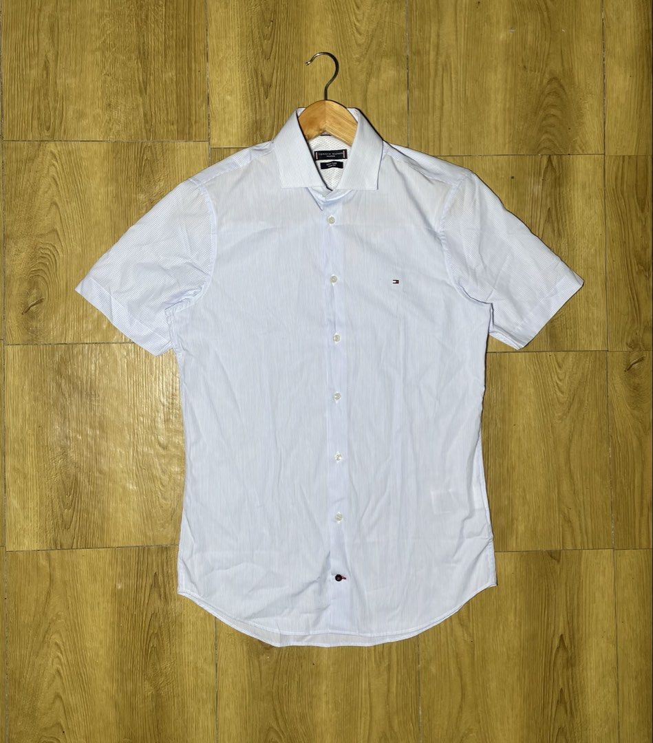 Tommy Hilfiger (Category: Tshirts & Polo Shirts ) located in Tacloban City. Submitted by susthriftshop (Listing ID 1467831735, Image 1). Description: Tommy Hilfiger button down Excellent condition Color rate 9.8/10 No issue Dimes 20 by 27 .