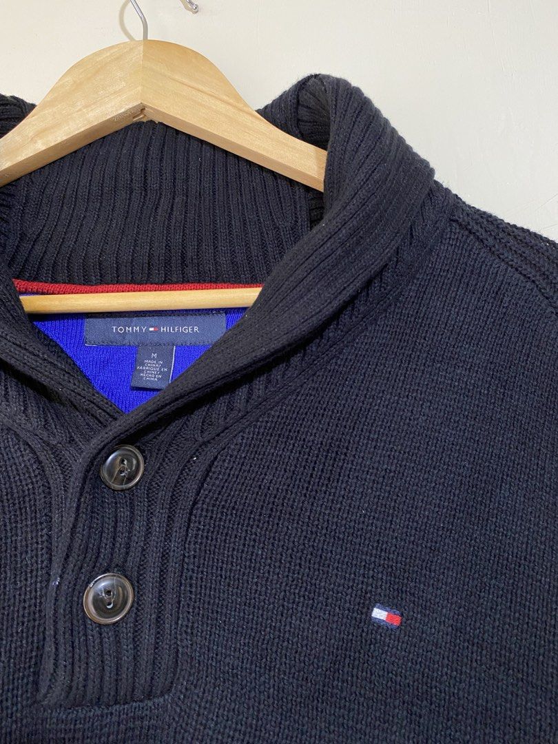 TOMMY HILFIGER,wide-neck pullover sweater (Category: Coats, Jackets and Outerwear) located in Cavite. Submitted by jc_thrift95 (Listing ID 1467779167, Image 2). Description: - This is a black Tommy Hilfiger men’s knit shawl-collar / wide-neck pullover sweater featuring a 1/4 button placket, ribbed cuffs and hem, and a small Tommy Hilfiger flag logo embroidery on the chest. - Medium - L- 27 inch - W- 24 inch - Color rate 8/10 (need wash) - See pic
