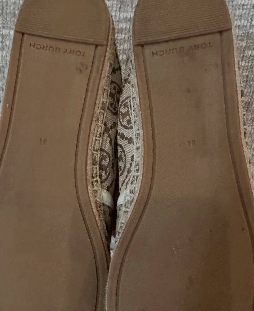 Tory Burch Monogram Espadrilles (Category: Flats & Sandals) located in Muntinlupa City. Submitted by ladybossgemini (Listing ID 1467725010, Image 2). Description: - Condition: 9/10 - Style: Monogram espadrilles / slip-on flats - Color: Beige and brown canvas with white trim - Size: US 8.5 - Features: Jute woven midsole, brown leather back heel pull tab - Guaranteed Authentic no box.
