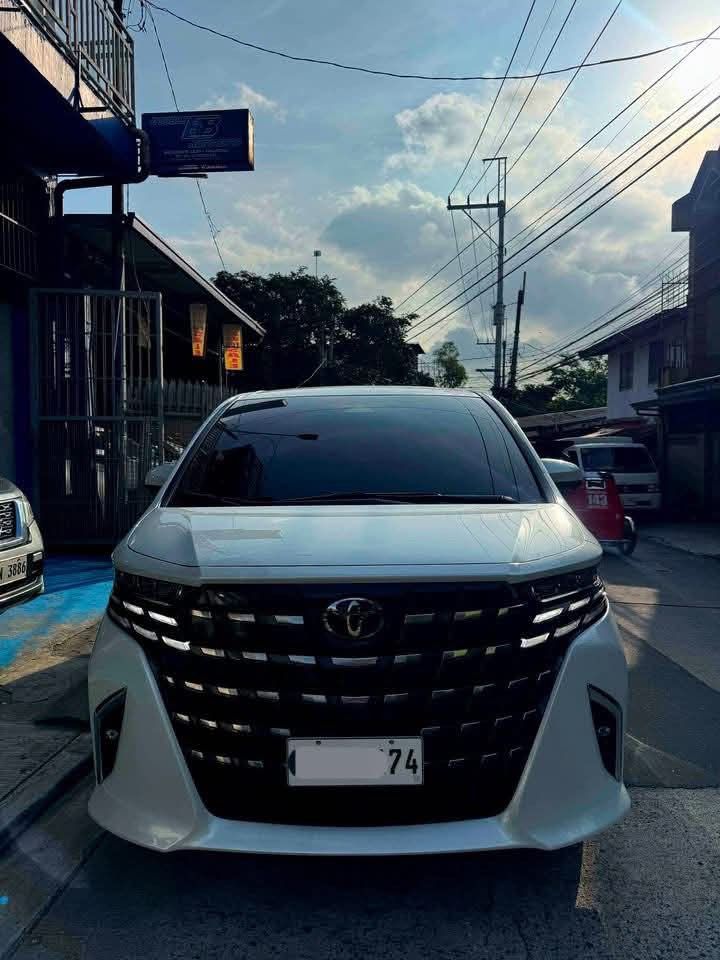 Toyota Alphard HEV Hybrid Auto (Category: Used Cars) located in Manila. Submitted by quality_cars (Listing ID 1467679227, Image 1). Description: 𝙁𝙊𝙍 𝙎𝘼𝙇𝙀 ‼️ 𝟐𝟎𝟐𝟓 𝐓𝐎𝐘𝐎𝐓𝐀 𝐀𝐋𝐏𝐇𝐀𝐑𝐃 𝐇𝐄𝐕 𝐇𝐘𝐁𝐑𝐈𝐃 Price: 4.095m 𝙒𝙀 𝘼𝘾𝘾𝙀𝙋𝙏 𝙏𝙍𝘼𝘿𝙀 𝙄𝙉 𝘼𝙉𝘿 𝙁𝙄𝙉𝘼𝙉𝘾𝙄𝙉𝙂‼️ ✅FIRST OWNER ✅MILEAGE 19tkm‼️ ✅COMPLETE PAPERS ✅GOOD AS NEW ✅FRESH IN AND OUT ✅NO ISSUE ✅Two doors automatic ✅ALMOST BRANDNEW ✅SLIGHTLY USED ✅LEATHER SEA