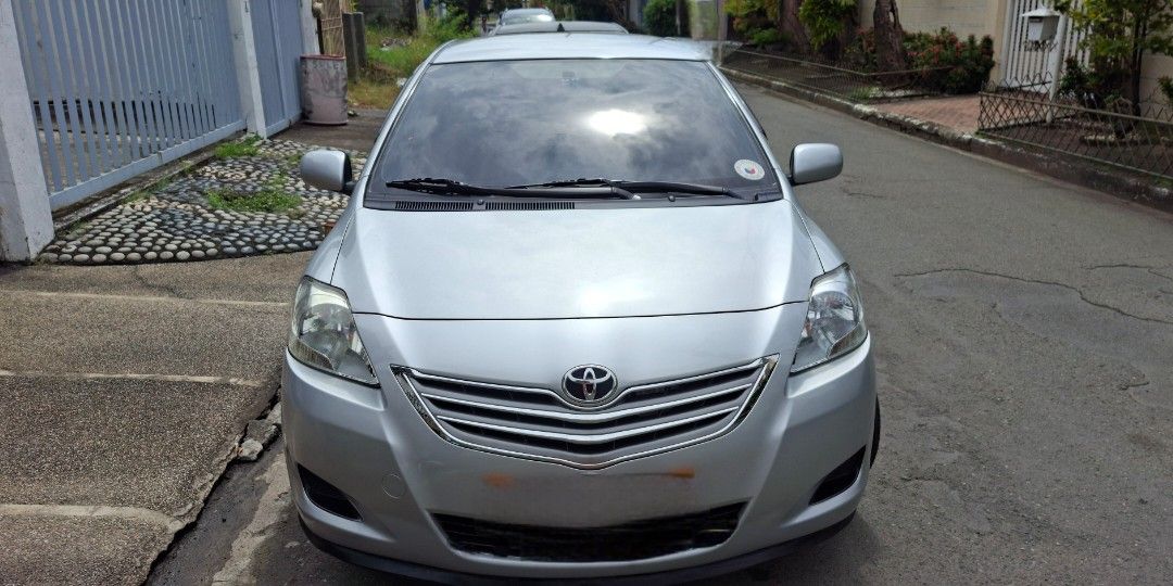 Toyota Vios E Manual (Category: Used Cars) located in Paranaque City. Submitted by mpg888 (Listing ID 1467710591, Image 2). Description: For Sale Toyota Vios 2012 model 1.3 E Manual (MT). Engine & Performance • Displacement: 1,329 • Transmission: 5-speed manual • Fuel System: Electronic Fuel Injection (EFI) • Fuel Type: Gasoline / Petrol • Fuel Tank Capacity: 42 liters Dimensions & Weight • Length: 4,300 mm • Seating Capacity: 5 persons Features 