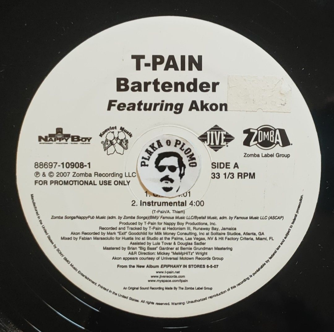 T-Pain - Bartender 12" Vinyl Record (Category: Vinyls) located in Quezon City. Submitted by plaka.o.plomo (Listing ID 1467701187, Image 2). Description: Artist(s) : T-Pain Song(s) : Bartender Year : 2007 Media : VG+ Color : Black Sleeve : Gen No. : 1x Vinyl Size : 12" RPM : 33 Country : US Catalog No. : 88697-10908-1 Tracklist : - Side A 1. Clean 4:01 2. Instrumental 4:00 - Side B 1. Main 4:01 2. Dirty Acappella 3:56 Notes : Sticker on record lab