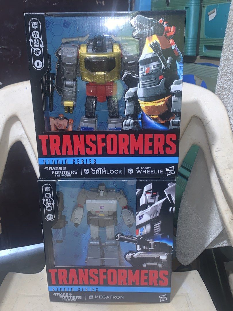 Transformers Studio Series 86 Dinobot Grimlock and Megatron set (Category: Action & Battle Toys) located in Taguig. Submitted by paradise.collections (Listing ID 1467640773, Image 1). Description: - Items: Transformers Studio Series Movie Boxes (2 sets) - Included: Dinobot Grimlock & Autobot Wheelie (Top Box) + Megatron (Bottom Box) - Condition: Brand new, unopened, figures untouched - Perfect for: Transformers collectors and fans - selling as a 
