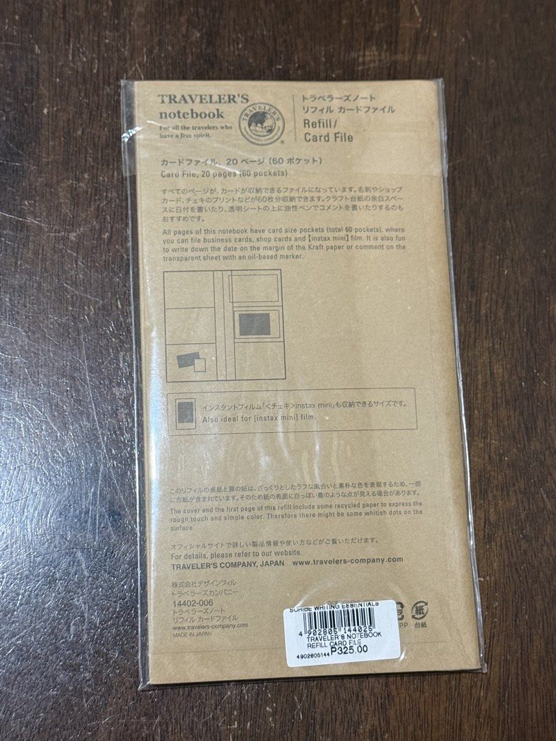 Traveler's Notebook Refill Card File 028 (Category: Stationery & School Supplies) located in Pasig City. Submitted by boredtakoyaki (Listing ID 1467713218, Image 2). Description: - Brand: Traveler's Company (Made in Japan) - Item: 028 Card File Refill - Condition: Brand new, unopened in original packaging with barcode sticker - Capacity: 20 pages with 60 total card pockets - Details: Kraft paper cover with brown sticker label.